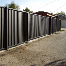 Vertical slatted fence