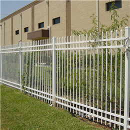 White wrought iron fence